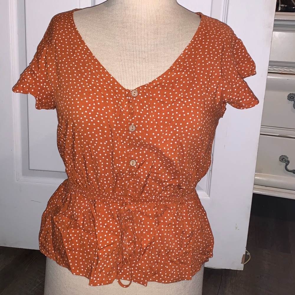 Orange with polka dot blouse